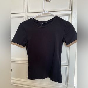 Black Zara t with sparkly gold trim sleeves